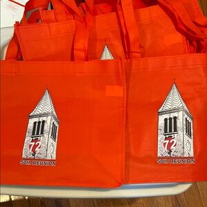 Four reusable Cornell U shopping bags